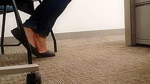 A Look At An Office Managers Well Worn Black Ballet Flats