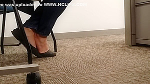 A Look At An Office Managers Well Worn Black Ballet Flats