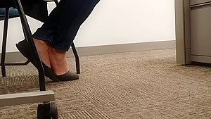 A Look At An Office Managers Well Worn Black Ballet Flats