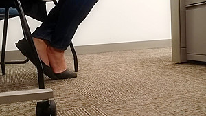 A Look At An Office Managers Well Worn Black Ballet Flats
