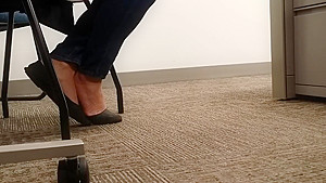 A Look At An Office Managers Well Worn Black Ballet Flats