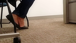 A Look At An Office Managers Well Worn Black Ballet Flats