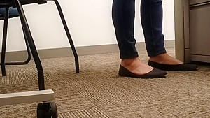 A Look At An Office Managers Well Worn Black Ballet Flats