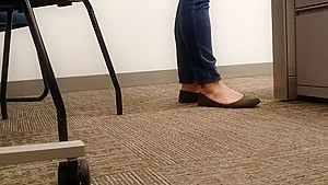 A Look At An Office Managers Well Worn Black Ballet Flats