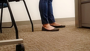 A Look At An Office Managers Well Worn Black Ballet Flats