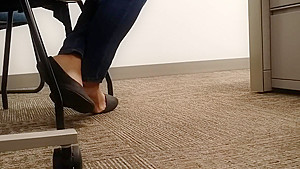 A Look At An Office Managers Well Worn Black Ballet Flats