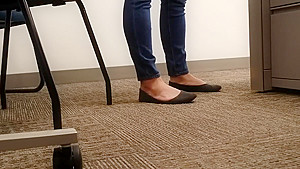 A Look At An Office Managers Well Worn Black Ballet Flats