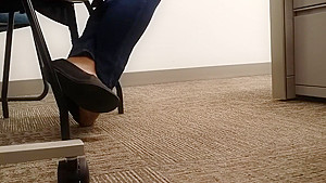 A Look At An Office Managers Well Worn Black Ballet Flats