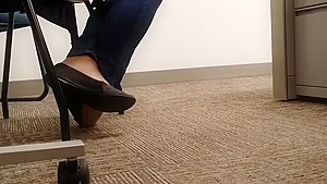 A Look At An Office Managers Well Worn Black Ballet Flats