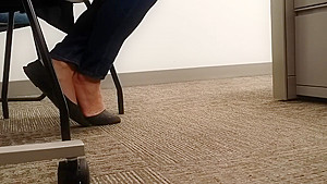 A Look At An Office Managers Well Worn Black Ballet Flats
