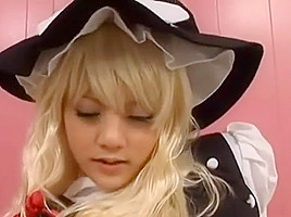 Amateur Girl in a Cosplay by Marisa Kirisame en Touhou Project