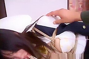 Asian brunette getting roped up and tongue pegged