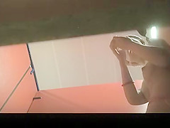 Asian woman dressing in change room