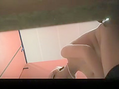 Asian woman dressing in change room