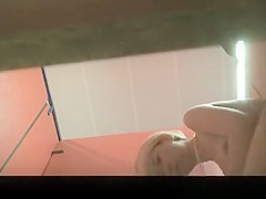 Asian woman dressing in change room