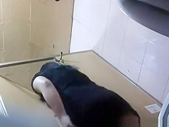 Asian women in public toilet peeing