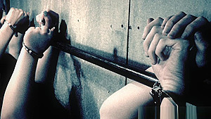 BDSM sub dominated in pillory before group