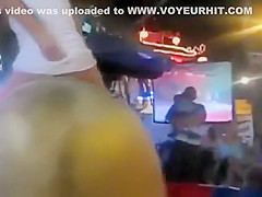Babe rides the bull and reveals the ass and tits