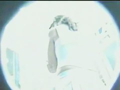 Bare bottom upskirt brunette in a baby blue skirt captured on film