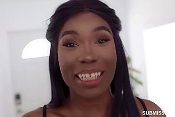 Beautiful black babe with a choker is holding her leg lifted high while getting fucked hard