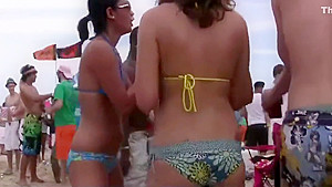 Beautiful naked blonde kiss, twerk, in a beach party