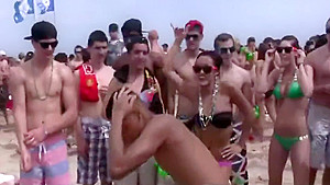 Beautiful naked blonde kiss, twerk, in a beach party