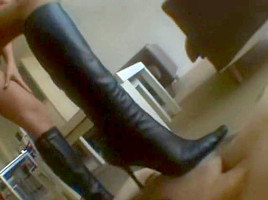 Big booty Jap dominatrix sits on her thrall