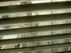 Big shaved pussy spied while peeing