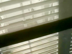 Big shaved pussy spied while peeing