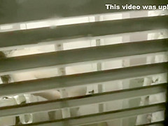 Big shaved pussy spied while peeing