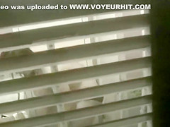 Big shaved pussy spied while peeing