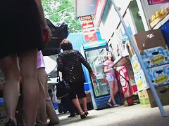 Black hair woman in a blue shirt underskirt video