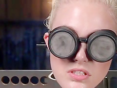 Blonde in device bondage rides Sybian