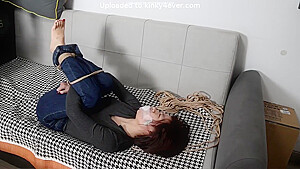 Bondage Girl On Sofa