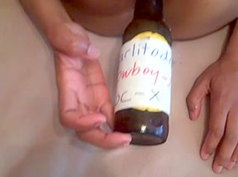 Bottles Up Her Chocolate Aperture And Vagina!