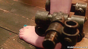 Brunette In Custom Made Device Flogged