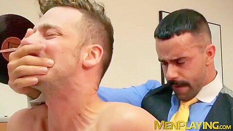 Businessmen relax and then have sex in their cozy office