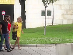 Busty babe walking naked in fountain