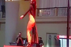 Busty chick stripping in high heels