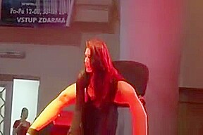 Busty chick stripping in high heels