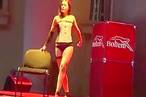 Busty chick stripping in high heels
