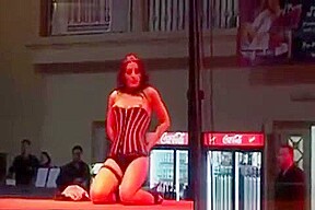 Busty chick stripping in high heels