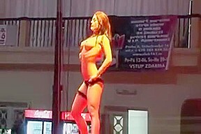 Busty chick stripping in high heels