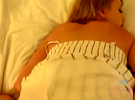 Charismatic blonde is using a sex toy while getting fingered, in the middle of the night