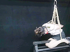 Chinese Model Sitting On A Iron Bar