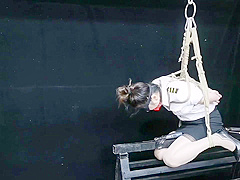 Chinese Model Sitting On A Iron Bar