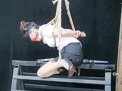 Chinese Model Sitting On A Iron Bar