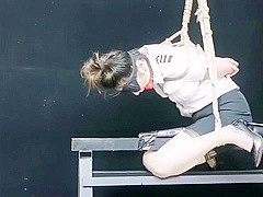 Chinese Model Sitting On A Iron Bar