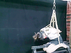 Chinese Model Sitting On A Iron Bar