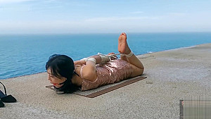 Chinese girl public bondage seaside